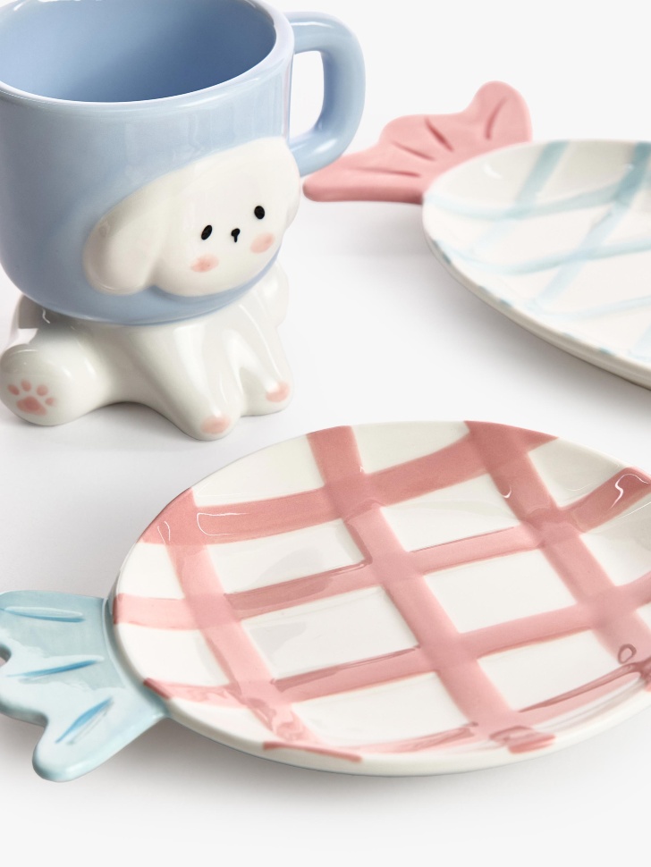 детская десертная тарелка из фарфора с декором от бренда sela вид слева