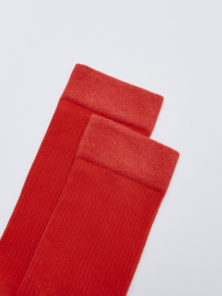 длинные носки от бренда sela вид слева