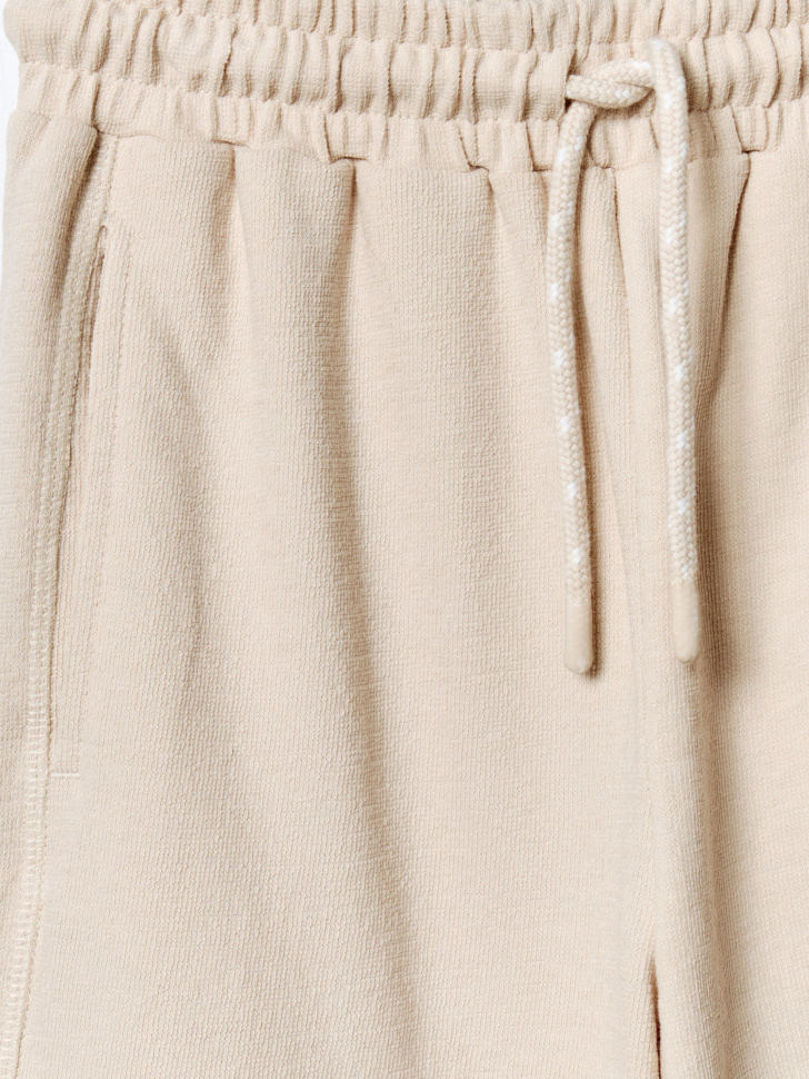 удлиненные трикотажные шорты для мальчиков из россии вид сбоку