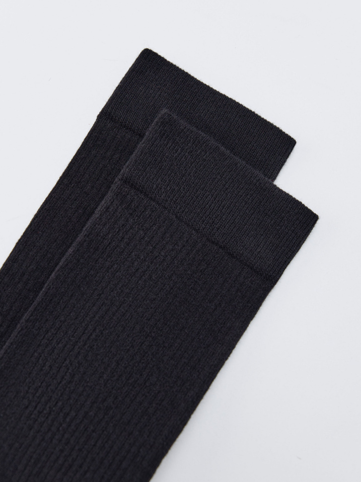 длинные носки от бренда sela вид слева