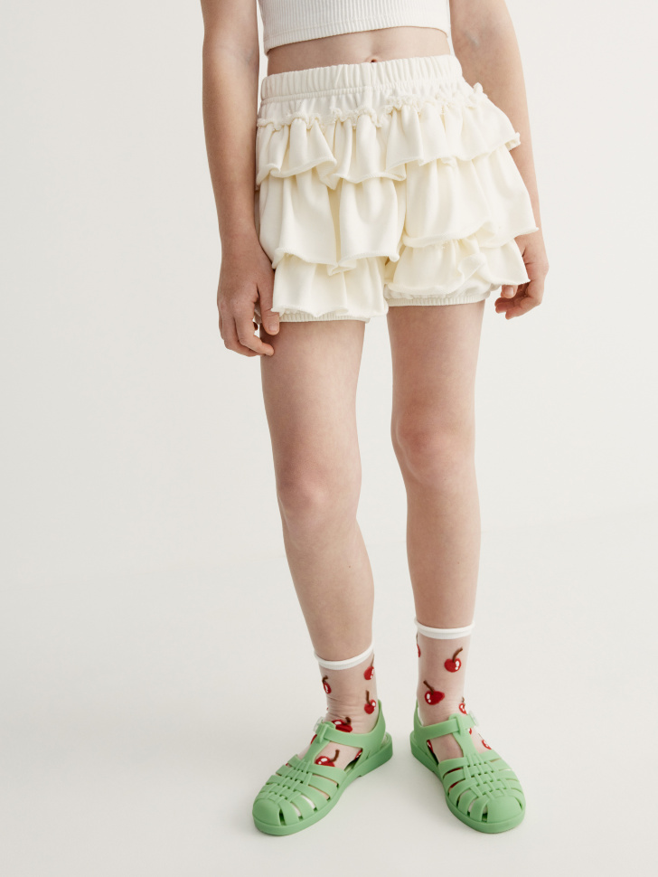 юбка-шорты из футера с оборками для девочек от бренда sela вид слева