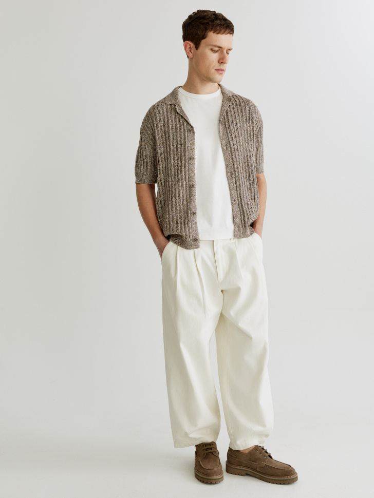 вязаное поло на пуговицах от бренда sela вид слева