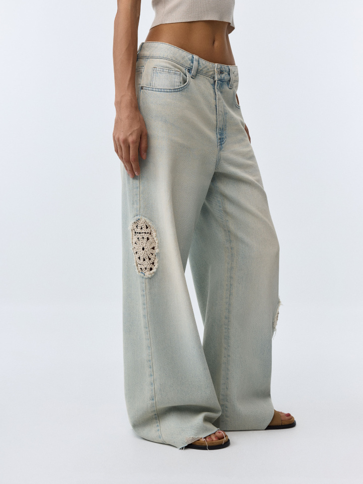 

Джинсы Wide Leg с разрывами