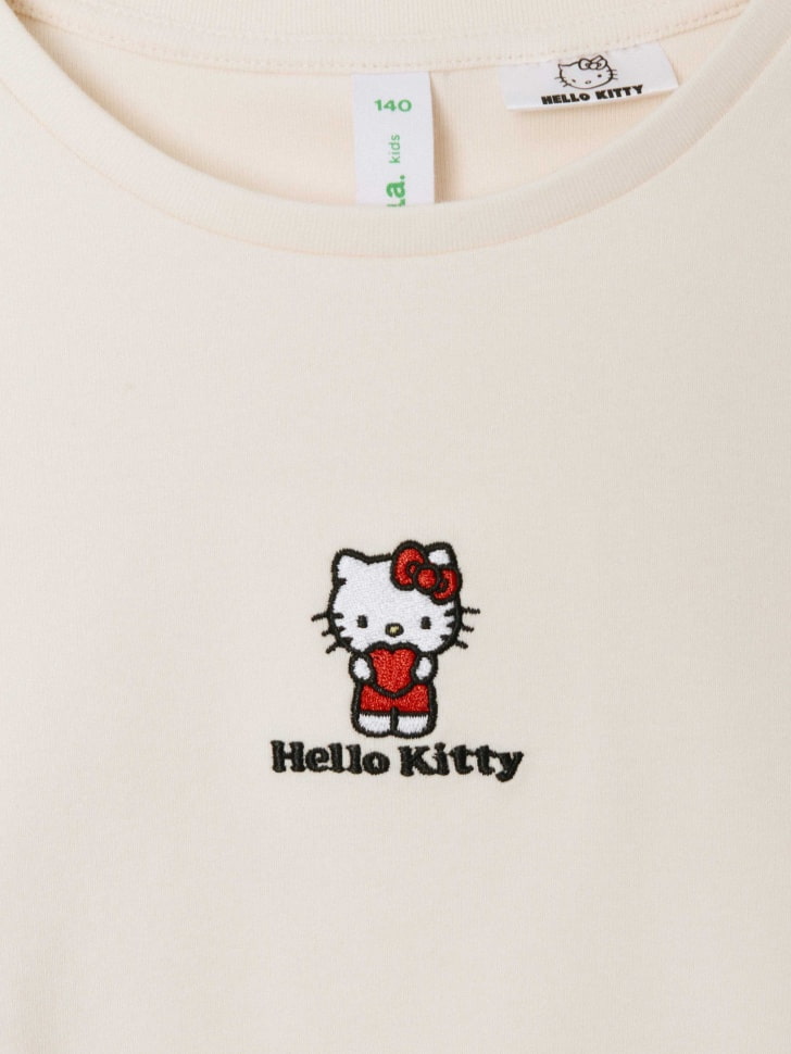 Укороченная футболка с принтом Hello Kitty для девочек. Фото №5