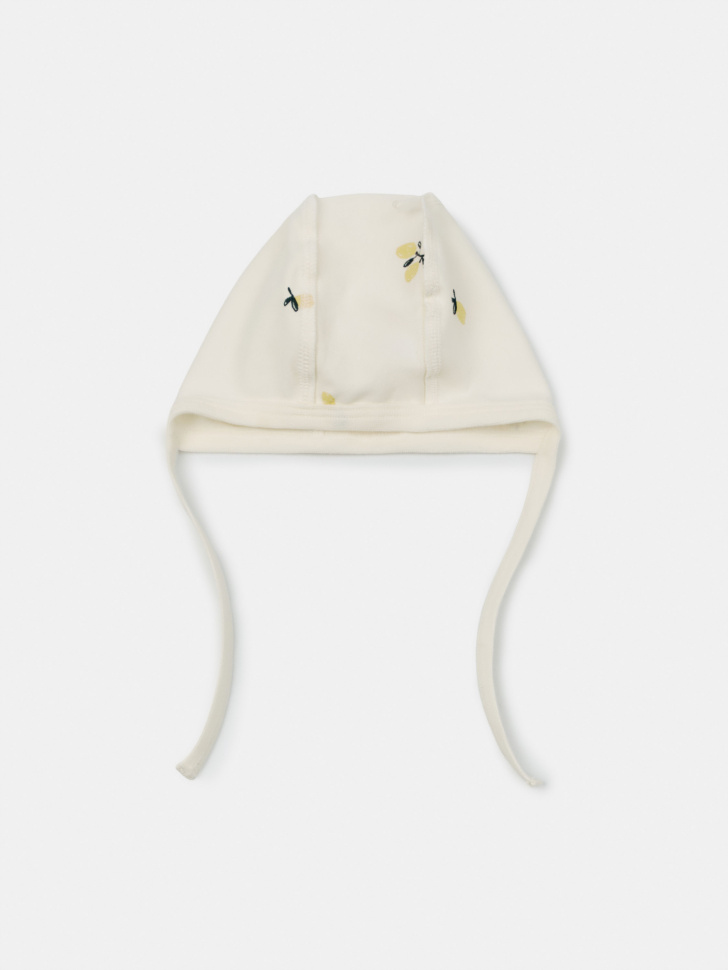 комплект из чепчика, боди и ползунков со швами наружу для малышей от бренда sela вид слева