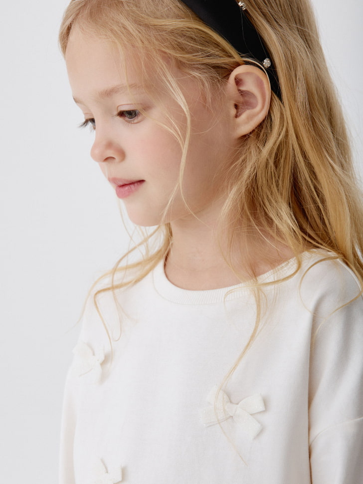 лонгслив с бантиками для девочек 4610517053176 в интернет магазине