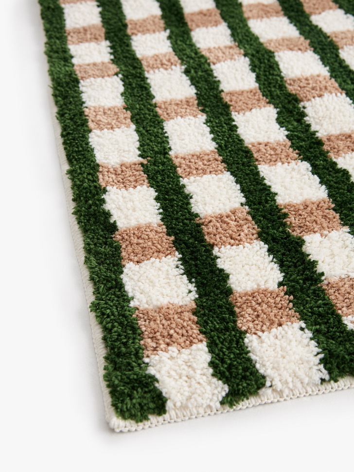 коврик для ванной в клетку от бренда sela вид слева