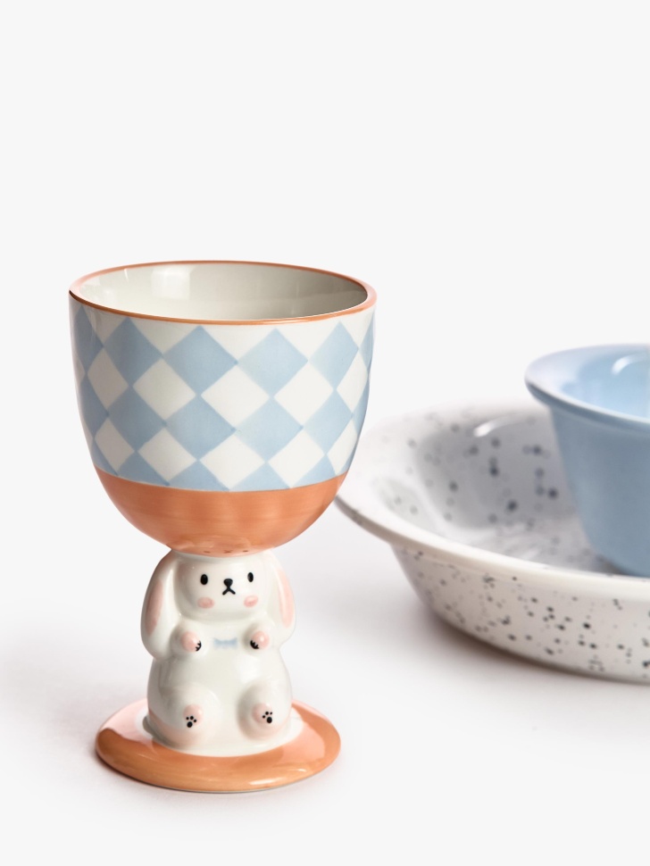 детский бокал из костяного фарфора с декором от бренда sela вид слева