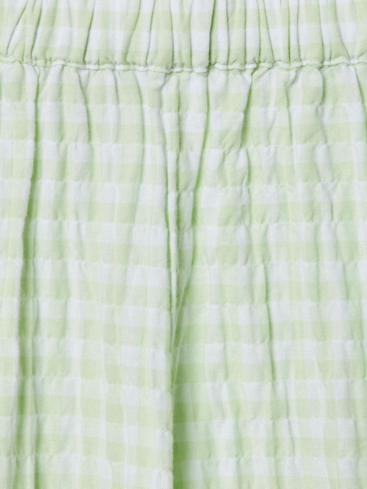 короткие шорты-блумеры в клетку для девочек из россии вид сбоку