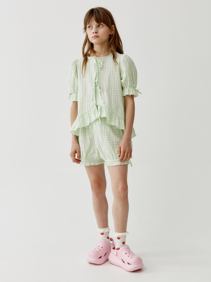 короткие шорты-блумеры в клетку для девочек из хлопка спереди