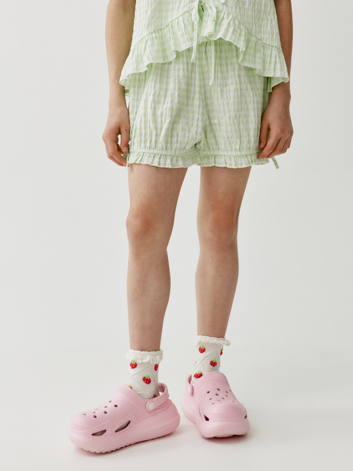 короткие шорты-блумеры в клетку для девочек от бренда sela вид слева