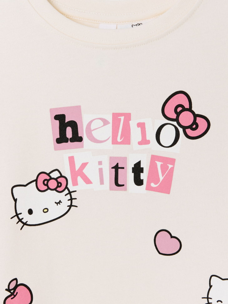 Футболка оверсайз с принтом Hello Kitty для девочек. Фото №6