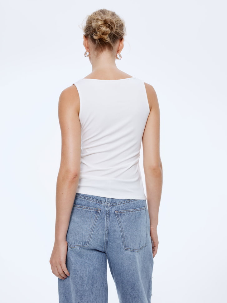 топ с рюшами в рубчик 4610517182272 с промокодом