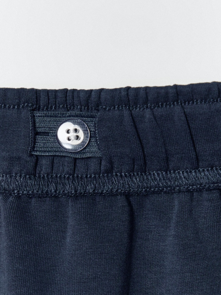 широкие брюки с лампасами для девочек спортивного стиля с лицевой стороны