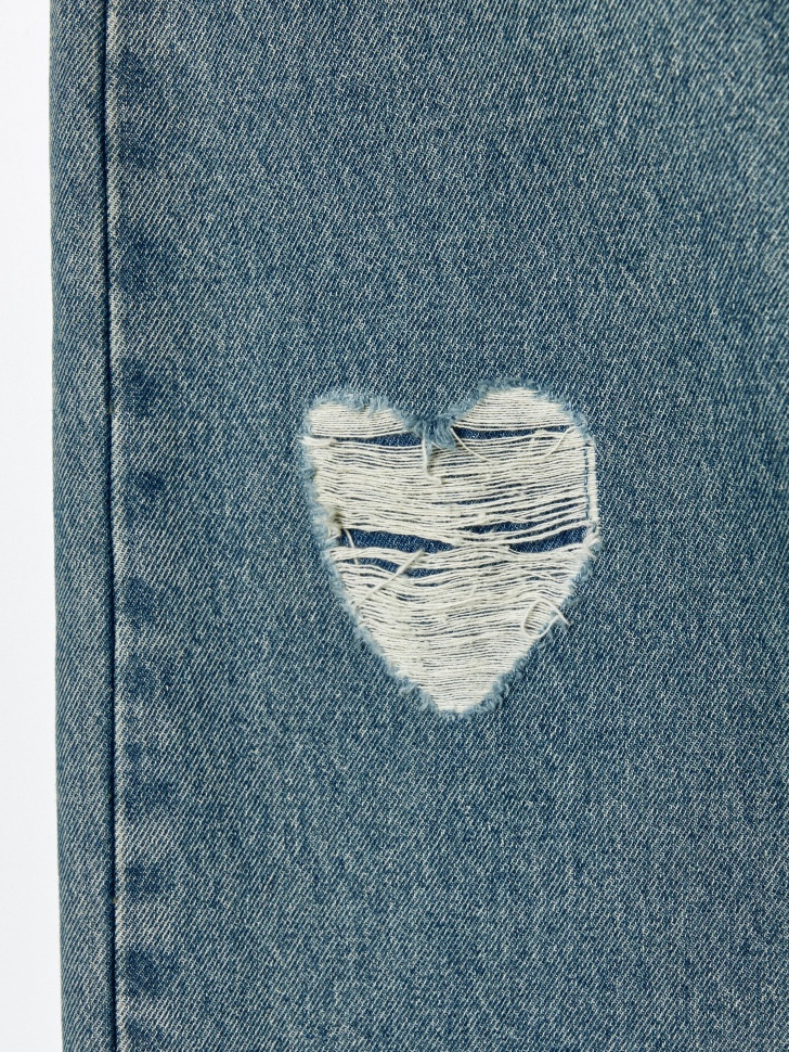 джинсы wide leg с фигурными разрывами для девочек от бренда sela вид слева