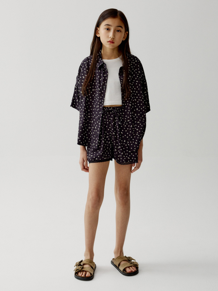 рубашка с короткими рукавами для девочек от бренда sela вид слева