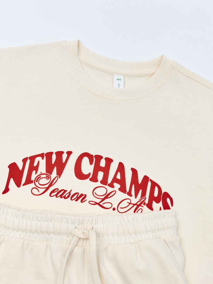 комплект из футболки и шорт для девочек из россии вид сбоку