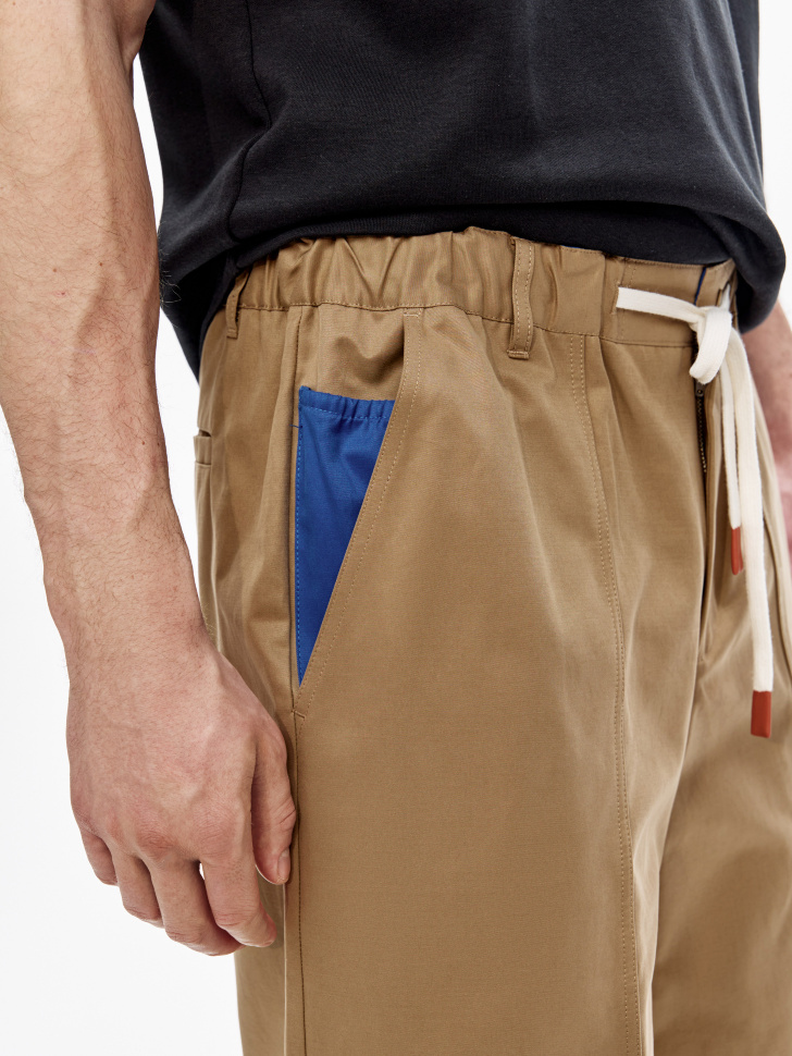 свободные шорты на резинке от бренда sela вид слева