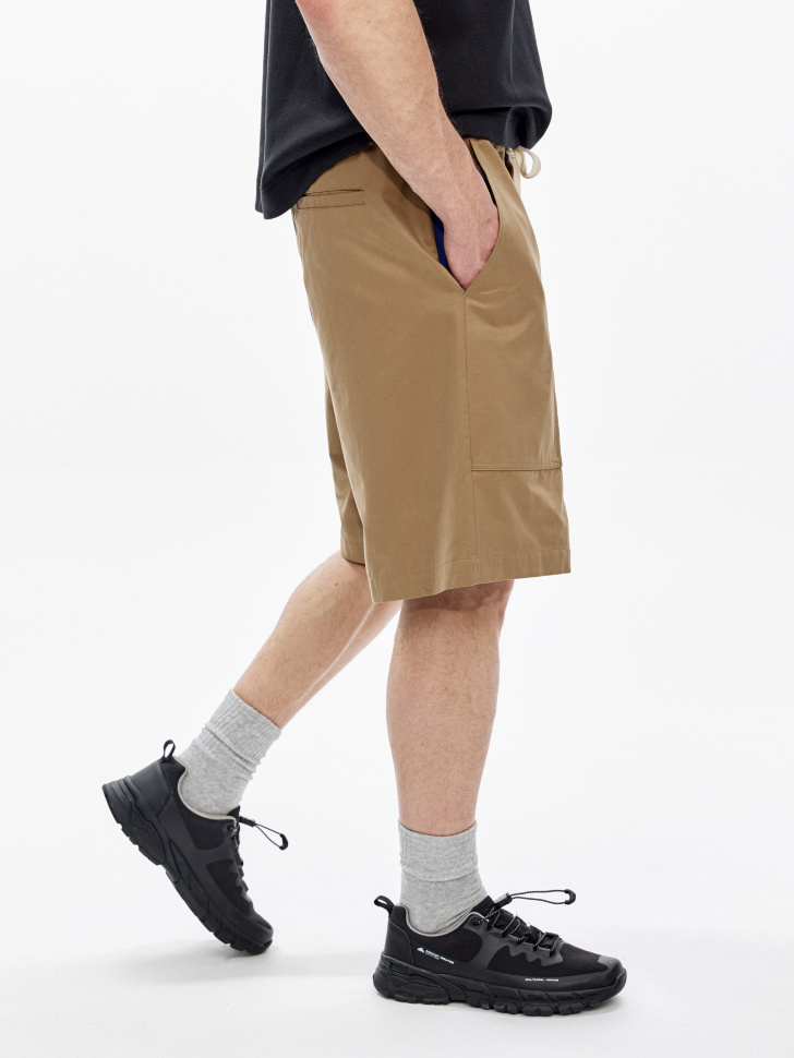 свободные шорты на резинке из россии вид сбоку