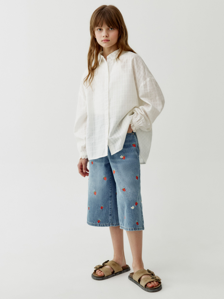 блузка оверсайз из фактурного хлопка для девочек от бренда sela вид слева