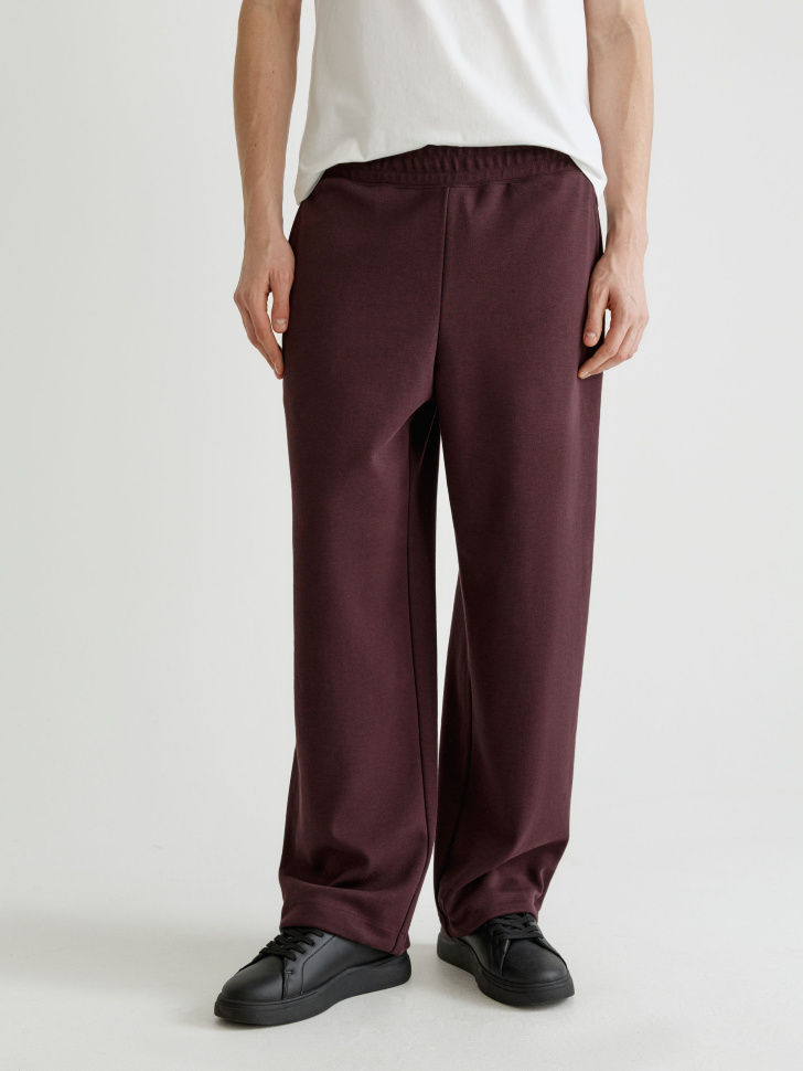 свободные трикотажные брюки от бренда sela вид слева