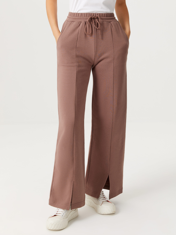 Трикотажные брюки с разрезами (коричневый, XL) от Sela