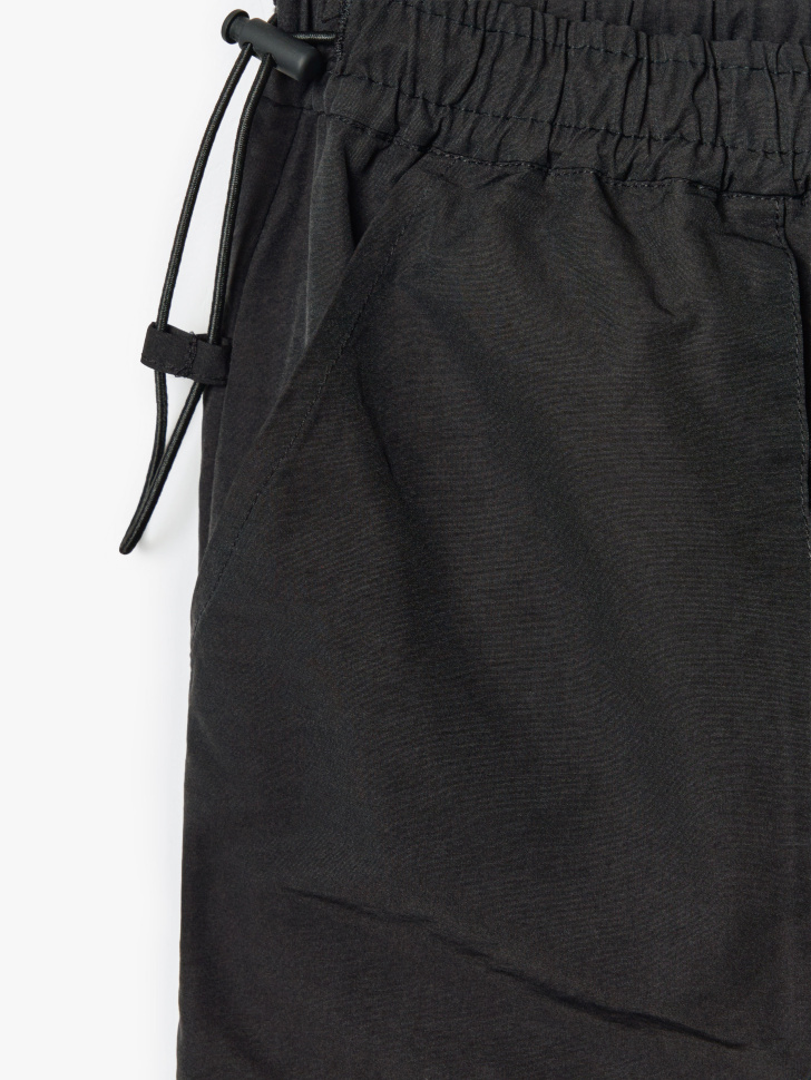 брюки-парашюты для девочек из россии вид сбоку