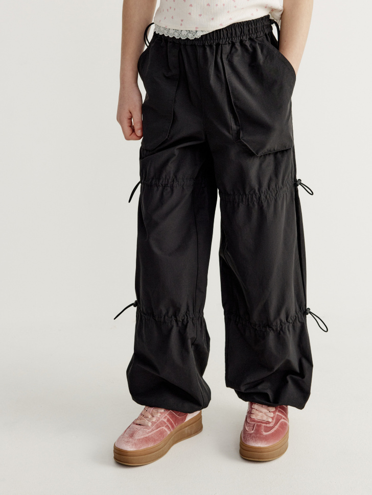 брюки-парашюты для девочек от бренда sela вид слева