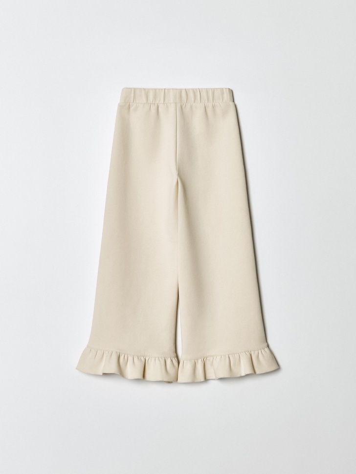 трикотажные брюки с оборками для девочек по цене 1499 руб вид справа