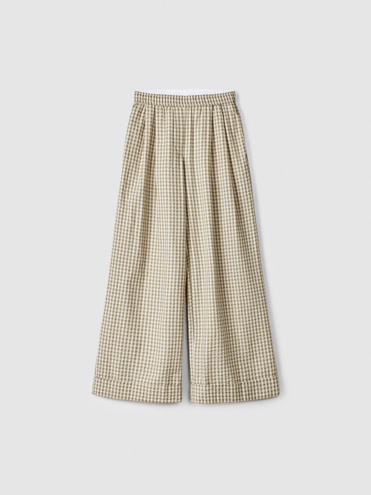 широкие брюки в клетку от бренда sela вид слева