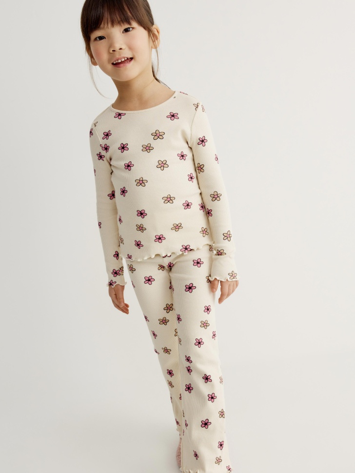 Трикотажные брюки клеш с принтом для девочек 999₽