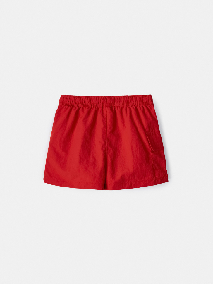 пляжные шорты для мальчиков от бренда sela вид слева