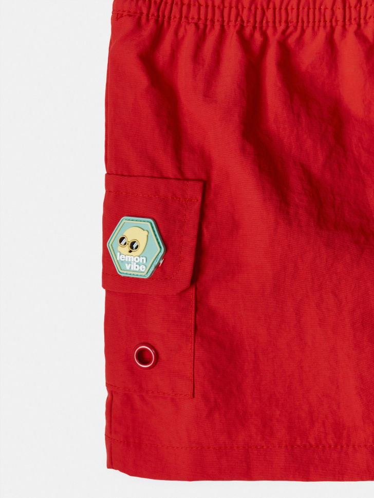 пляжные шорты для мальчиков по цене 1399 руб вид справа