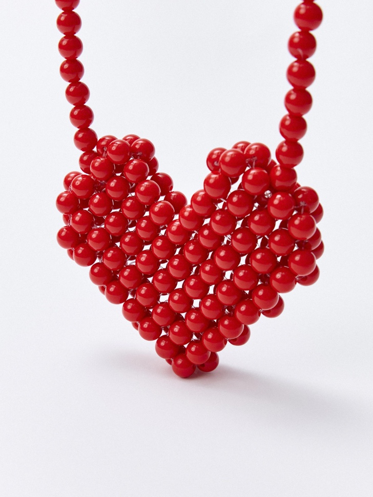 сумка кросс-боди из бусин для девочек от бренда sela вид слева