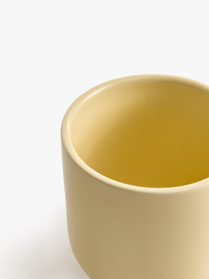 кружка из фарфора от бренда sela вид слева