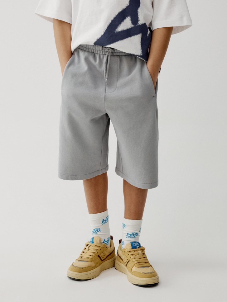 трикотажные удлиненные шорты для мальчиков из россии вид сбоку