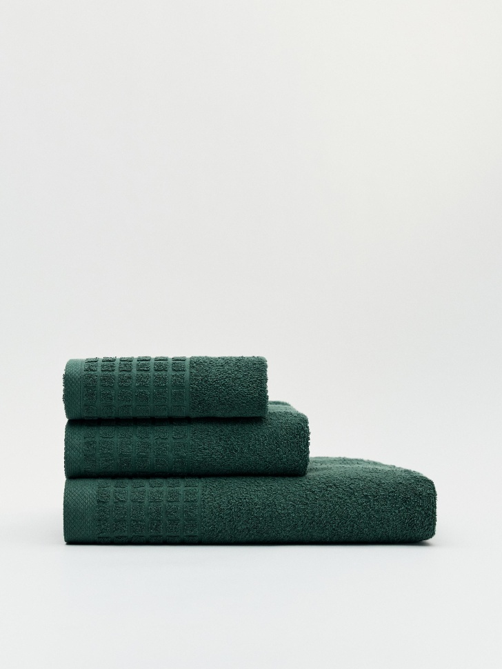 банное полотенце от бренда sela вид слева