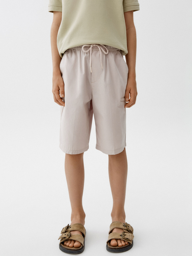 хлопковые шорты с карманами для мальчиков от бренда sela вид слева