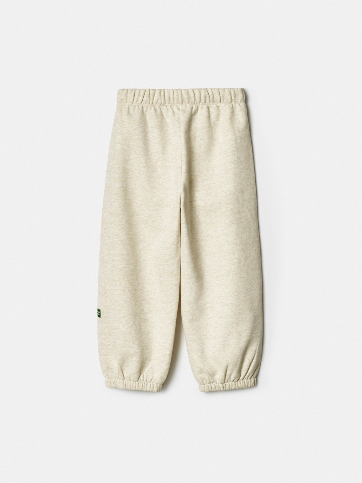 джоггеры оверсайз детские от бренда sela вид слева