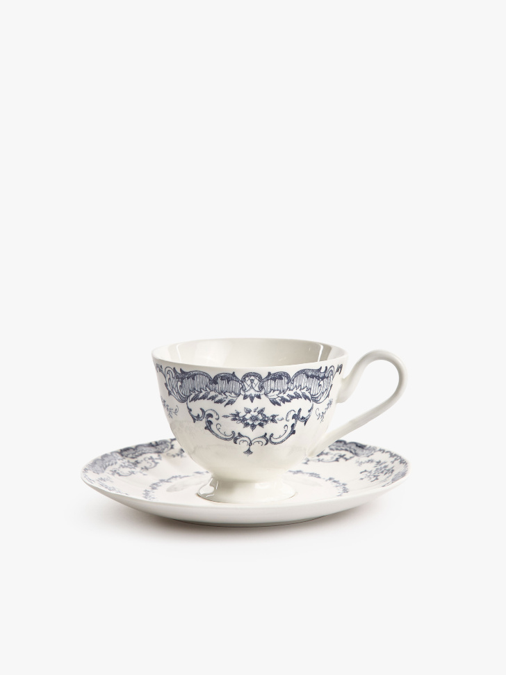 чайная пара из фарфора с цветочным узором от бренда sela вид слева