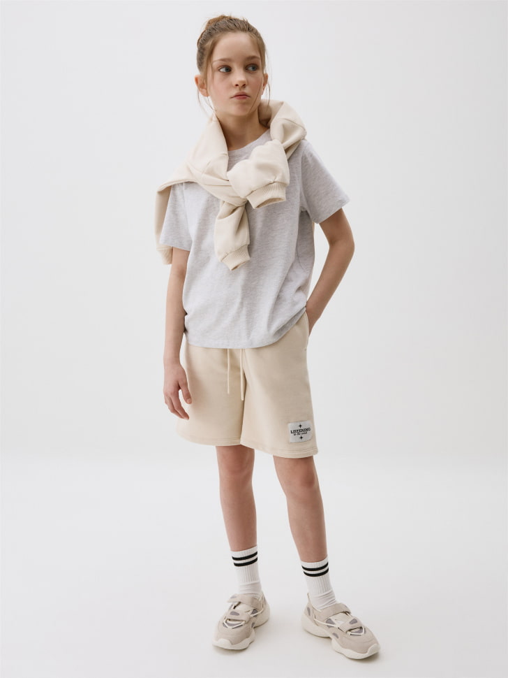 базовая футболка детская от бренда sela вид слева