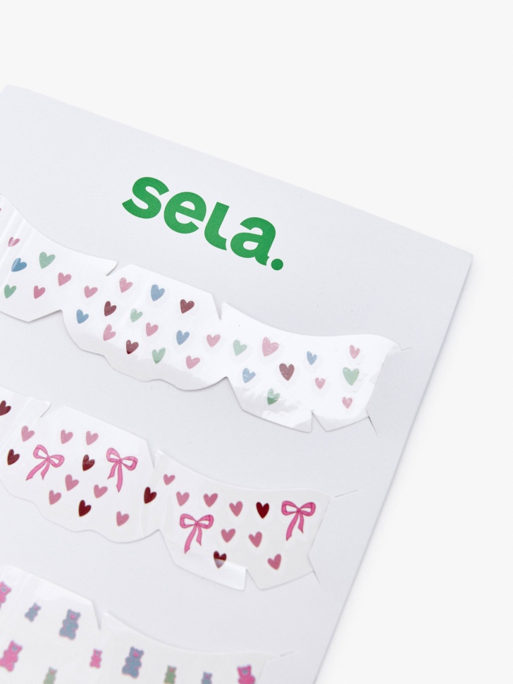 переводные веснушки от бренда sela вид слева