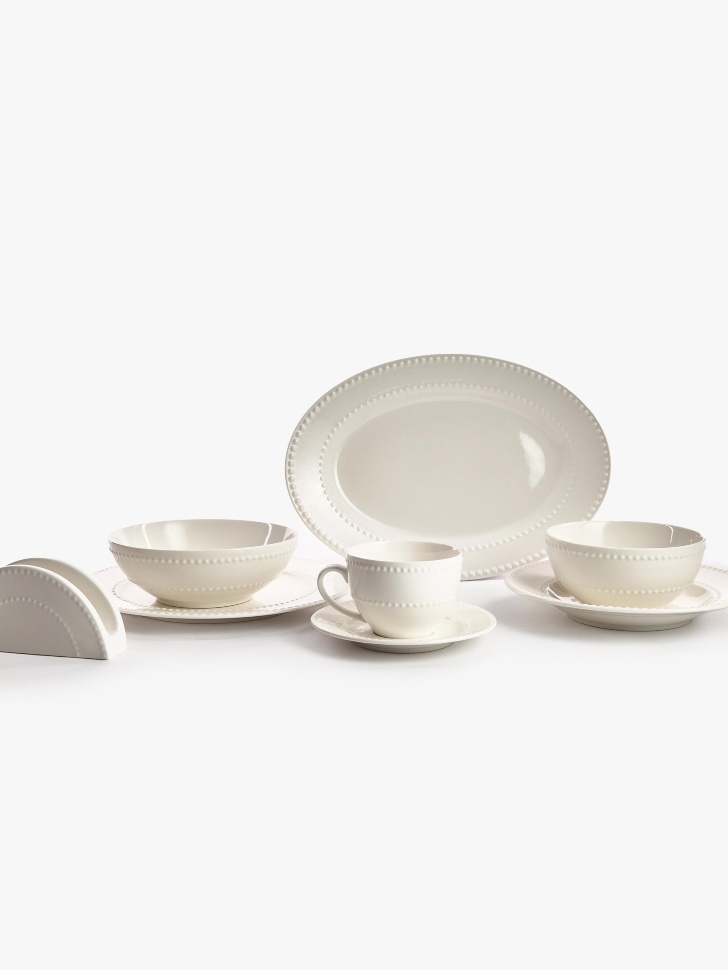 чайная пара из костяного фарфора от бренда sela вид слева