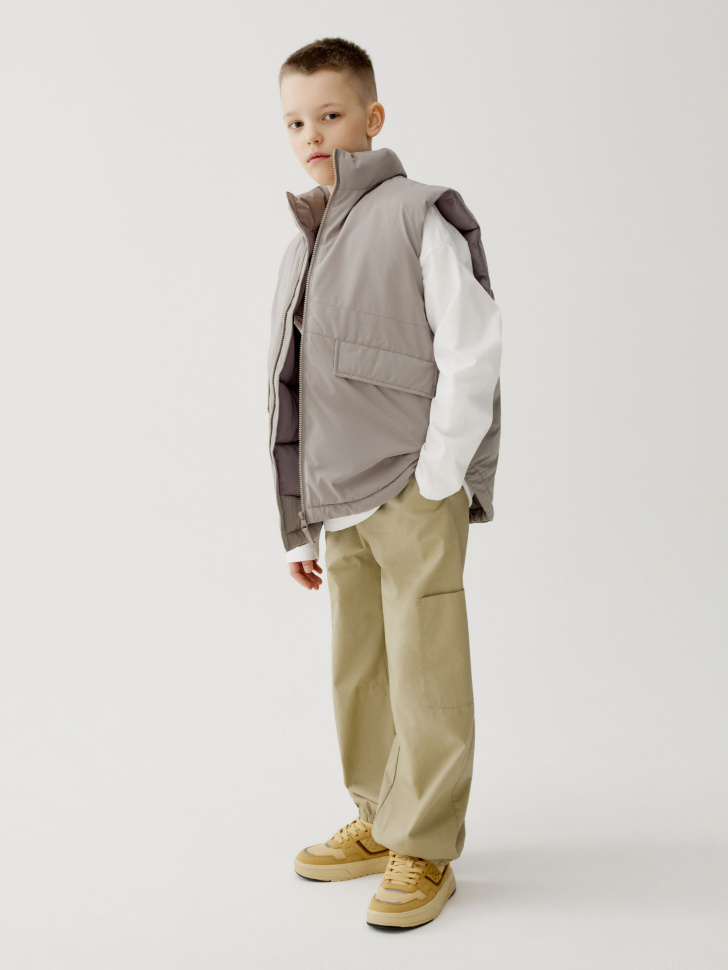 дутый жилет для мальчиков от бренда sela вид слева