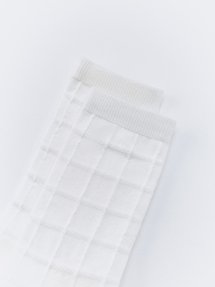 носки с рельефным узором в клетку от бренда sela вид слева