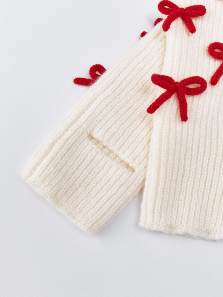 вязаные гетры с бантиками для девочек от бренда sela вид слева