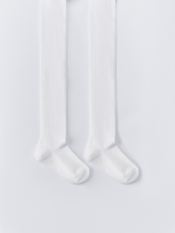 трикотажные колготки с бантиками для девочек от бренда sela вид слева