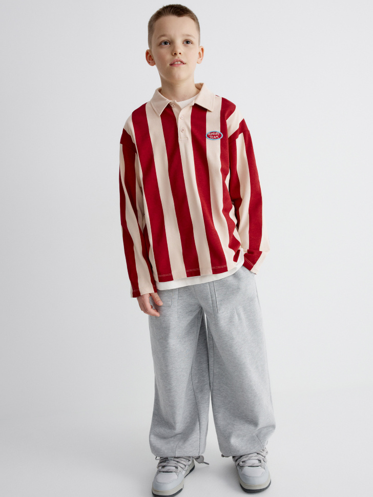 трикотажное поло в полоску для мальчиков от бренда sela вид слева