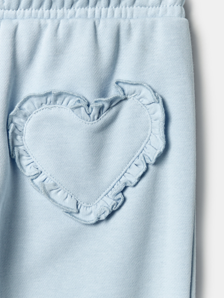 джоггеры с баской для девочек по цене 1799 руб вид справа