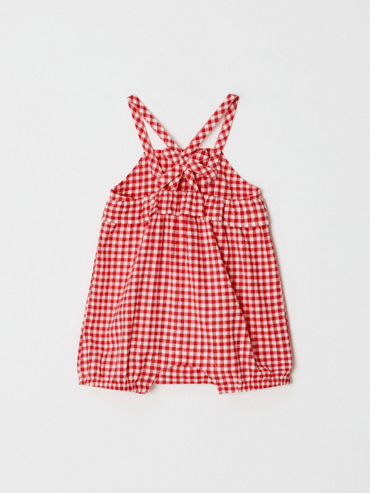 хлопковый комбинезон для малышей от бренда sela вид слева